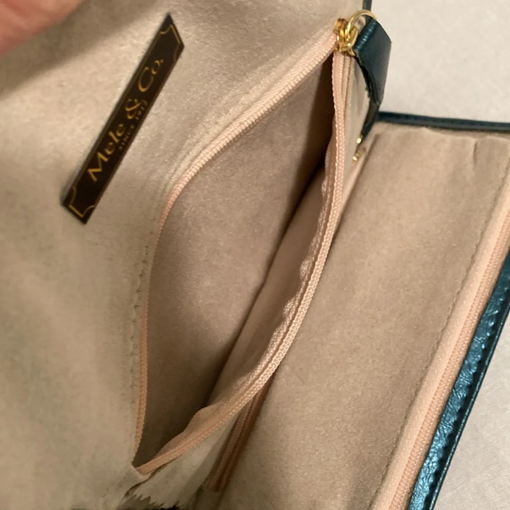 Mele & Co jewelry roll travel case teal blue